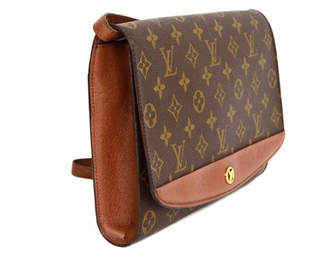 louis vuitton tan clutch|Louis Vuitton clutch monogram.